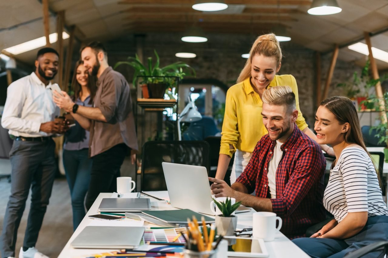 young-web-designers-working-together-at-modern-office.jpg